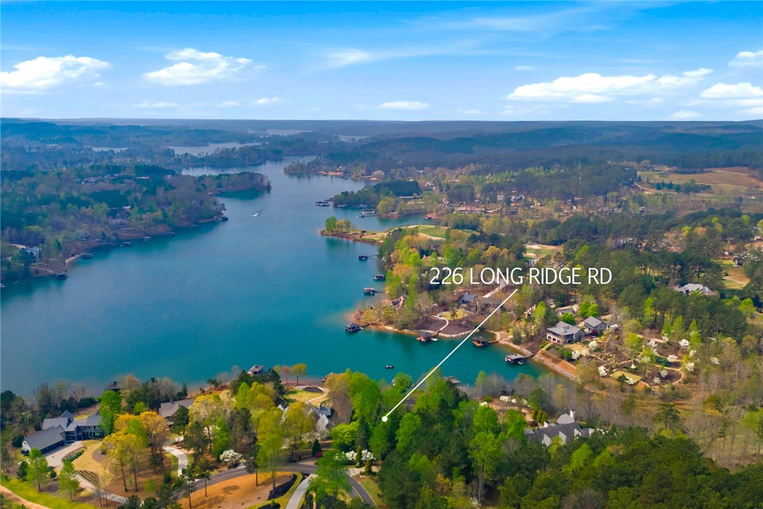 226 Long Ridge Road Sunset, SC 29685 - Photo 48 of 50 This panoramic aerial view captures the serene waterfront community, showcasing lush landscapes and expansive water.