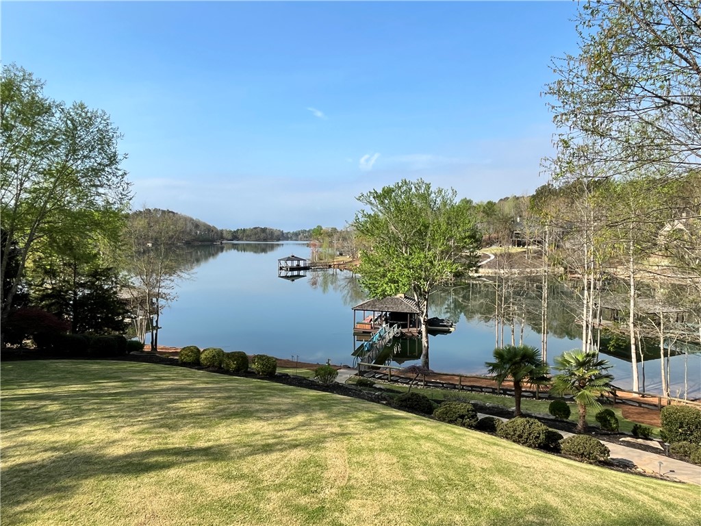 226 Long Ridge Road Sunset, SC 29685 - Photo 49 of 50 This serene lakeside property offers tranquil water views and lush, expansive green space.
