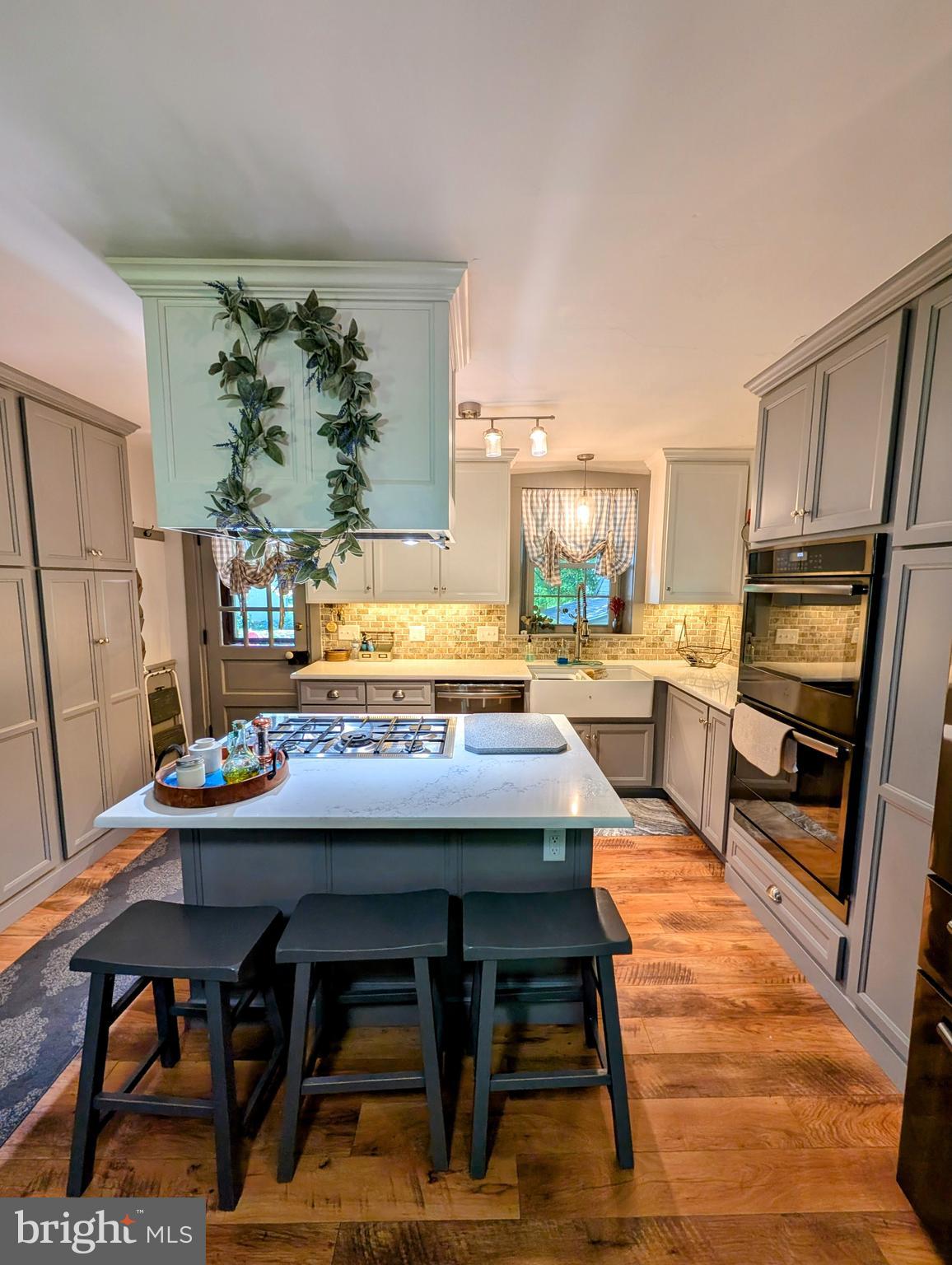 1890 Millport Road Lancaster, PA 17602 - Photo 22 of 57 Kitchen Center Island W/Stovetop & Stools