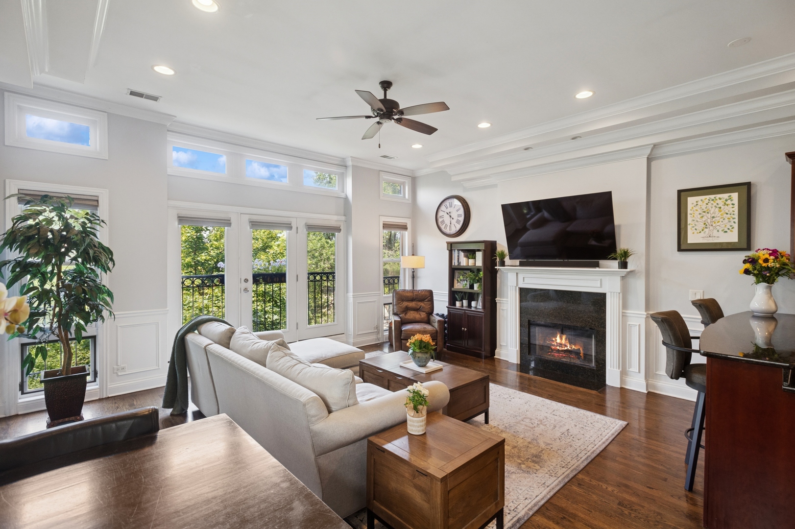 3331 North Seminary Avenue, Unit 3 Chicago, IL 60657 - Photo 2 of 19 a living room with furniture a fireplace and a flat screen tv