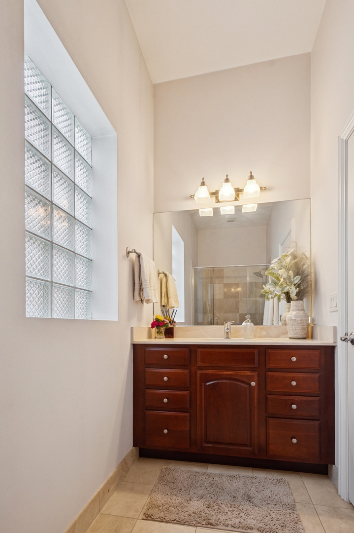 3331 North Seminary Avenue, Unit 3 Chicago, IL 60657 - Photo 9 of 19 a room with a cabinets and window