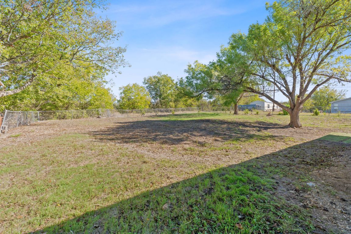 130 Meyers Road Buda, TX 78610 - Photo 20 of 35 a view of dirt yard with trees