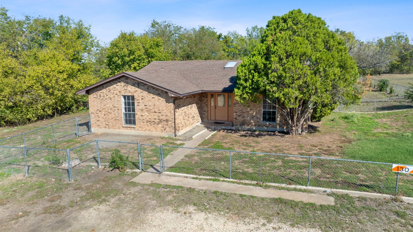 130 Meyers Road Buda, TX 78610 - Photo 22 of 35 a house view with a backyard space