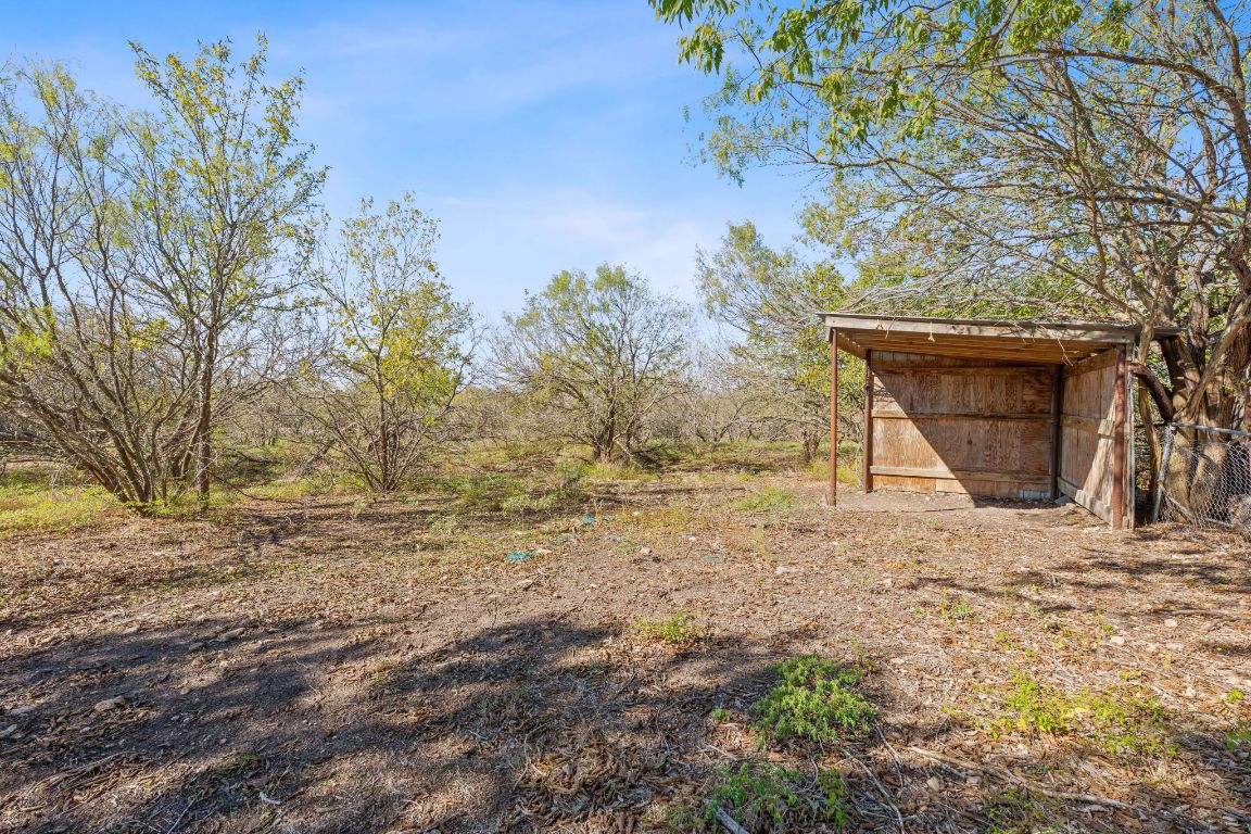 130 Meyers Road Buda, TX 78610 - Photo 29 of 35 a view of a house with a yard