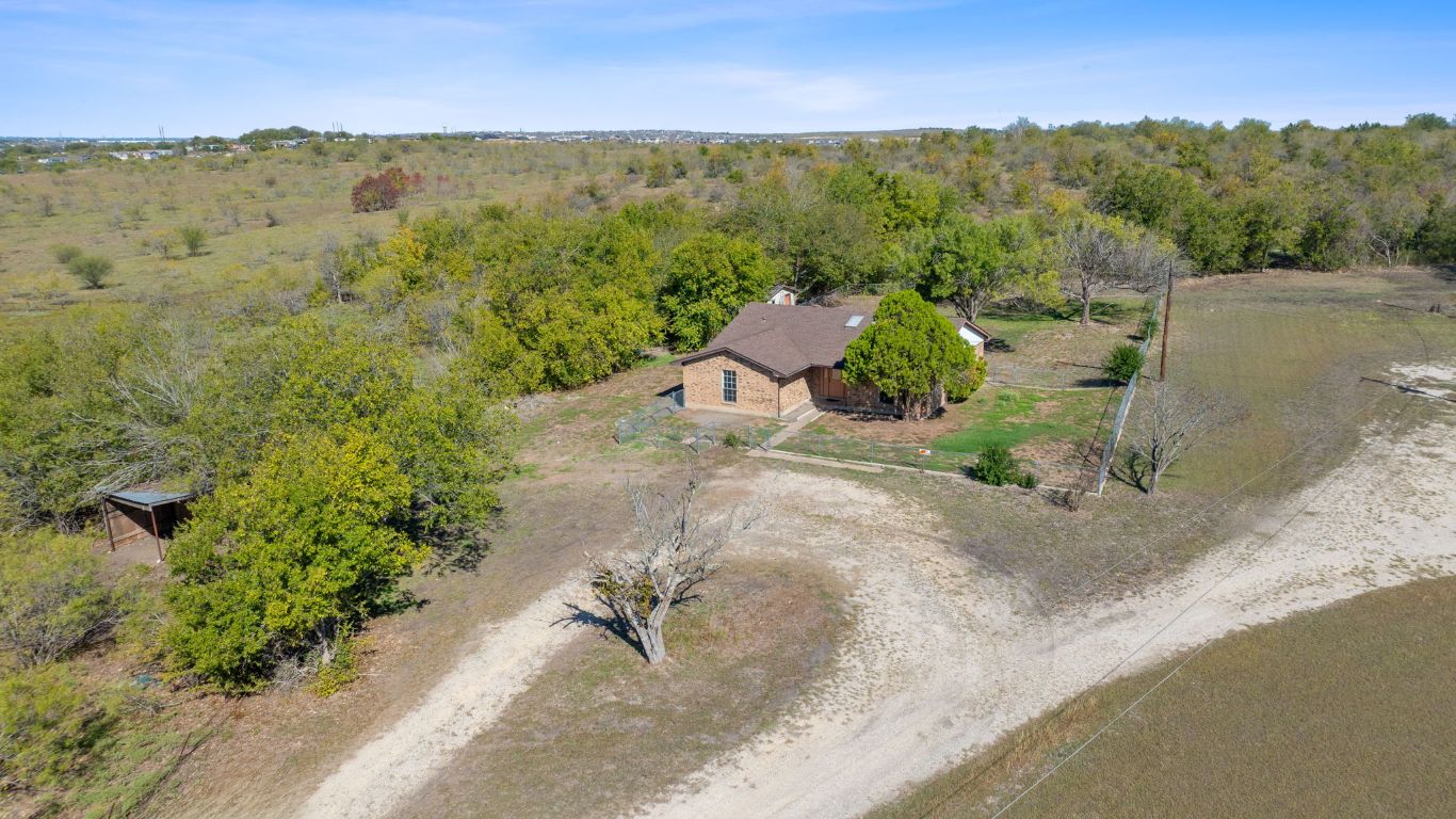 130 Meyers Road Buda, TX 78610 - Photo 3 of 35 an aerial view of a houses with a yard