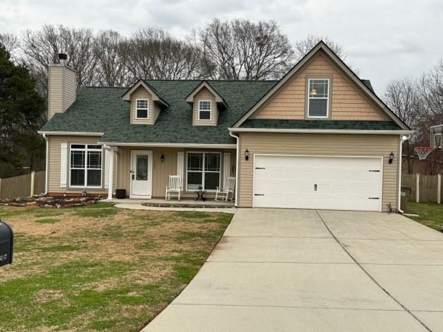 567 Morgans Ridge Court Winder, GA 30680 - Photo 1 of 1 a front view of a house with a garden