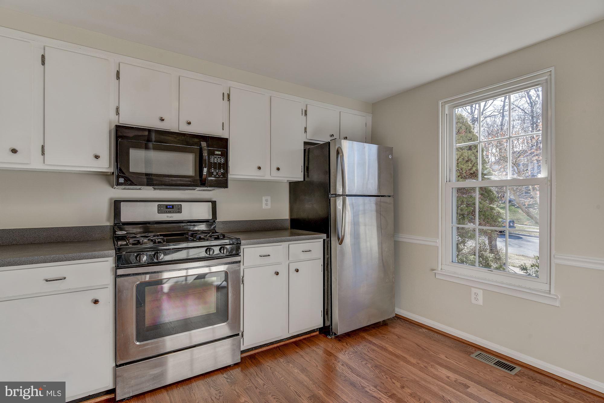 14620 Sandy Ridge Road Silver Spring, MD 20905 - Photo 3 of 35 Stainless Appliances w/ Bright Natural Light