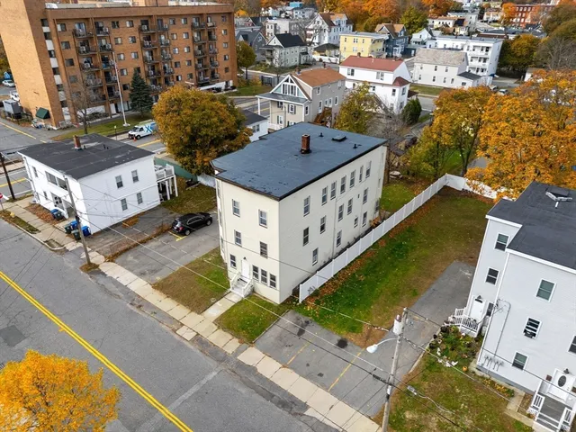 a view of a building with a street