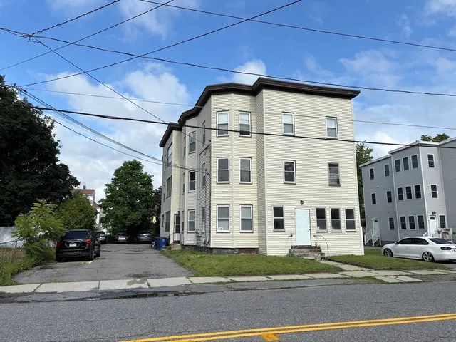 a car parked in front of a house