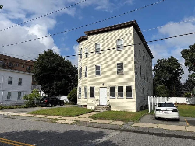 a view of a house with a door and a window