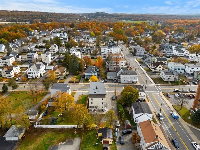 an aerial view of residential house with parking space