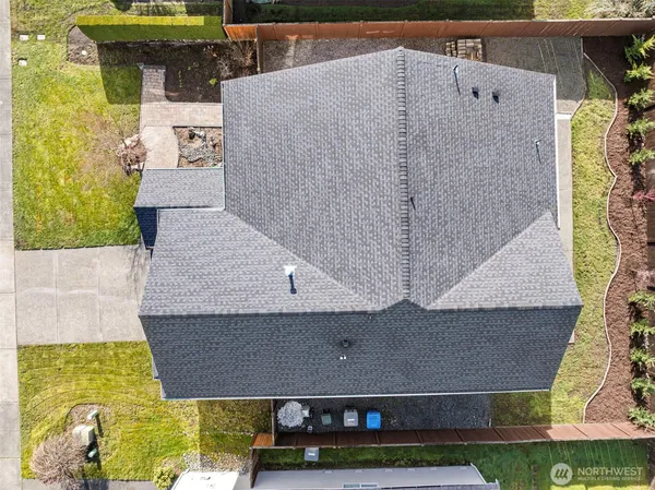 a aerial view of a house with a swimming pool