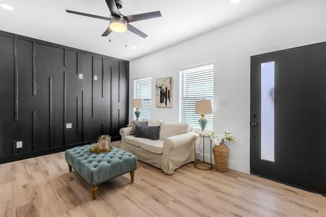 a living room with furniture and a window