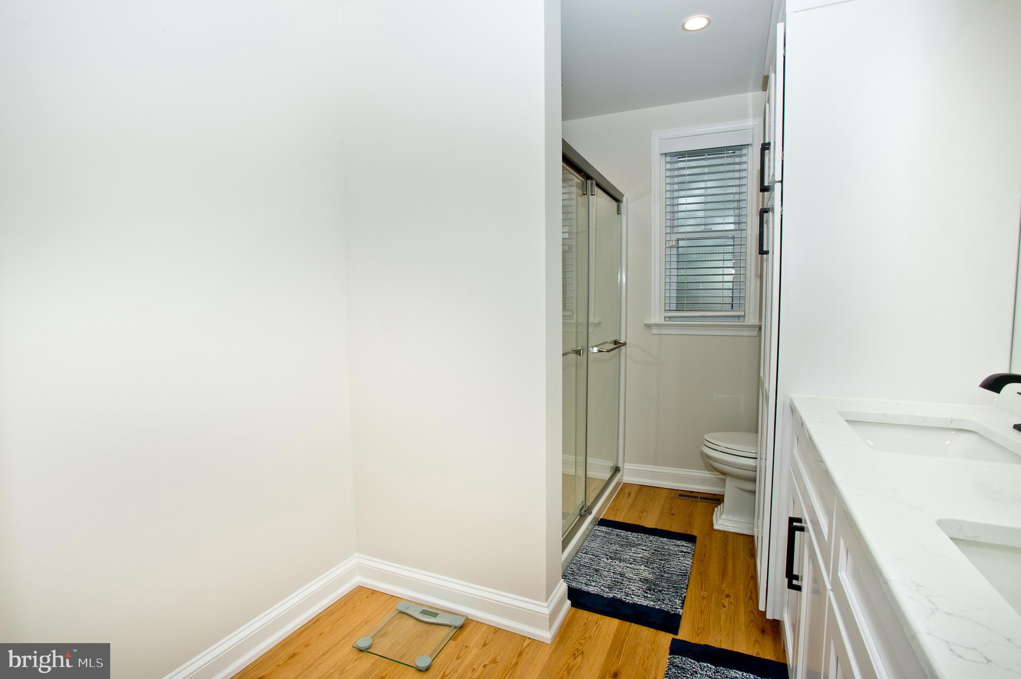 500 East Lancaster Avenue, Unit 135A Wayne, PA 19087 - Photo 15 of 24 a bathroom with a sink and a toilet