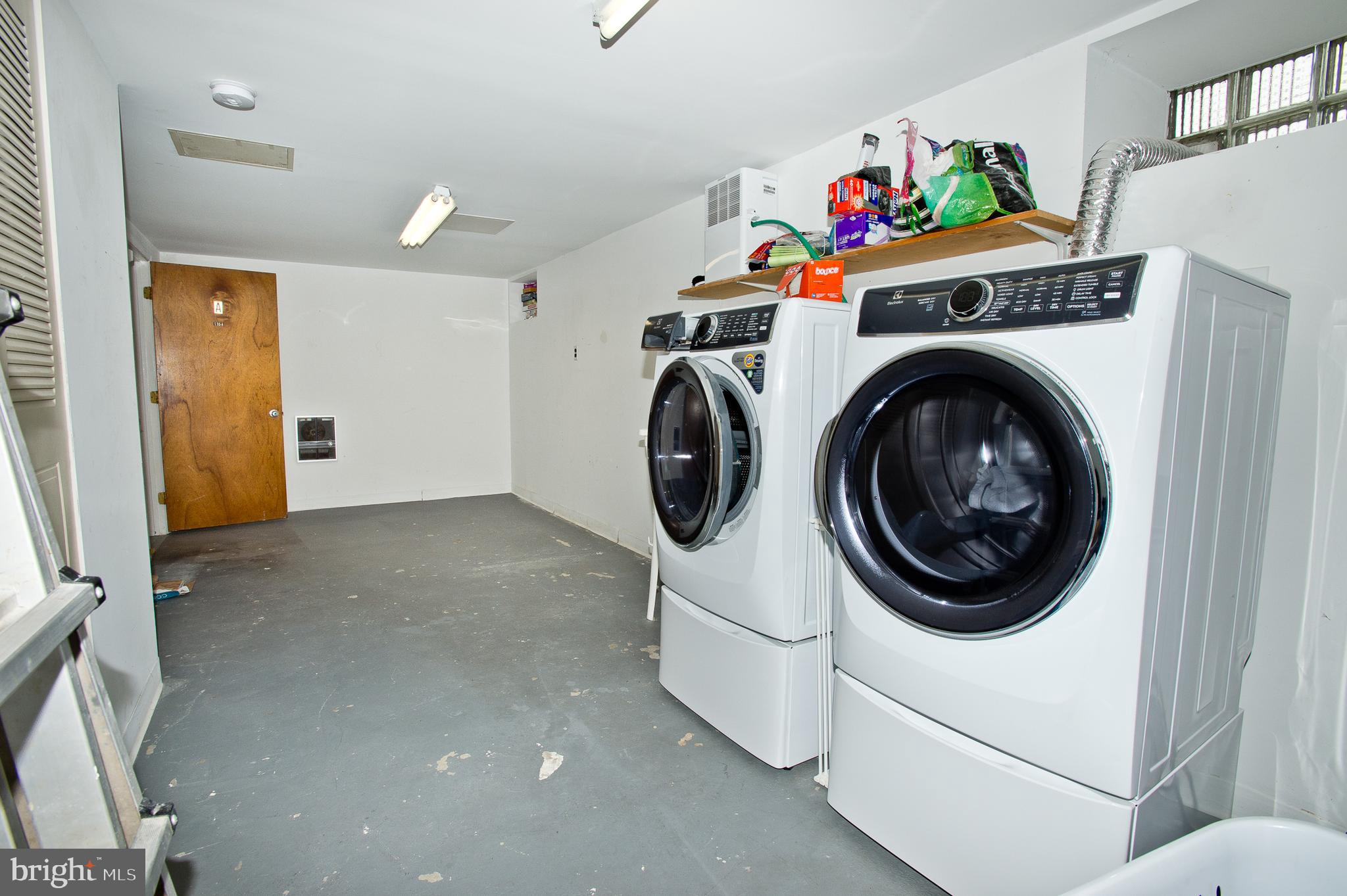 500 East Lancaster Avenue, Unit 135A Wayne, PA 19087 - Photo 22 of 24 a utility room with dryer and washer
