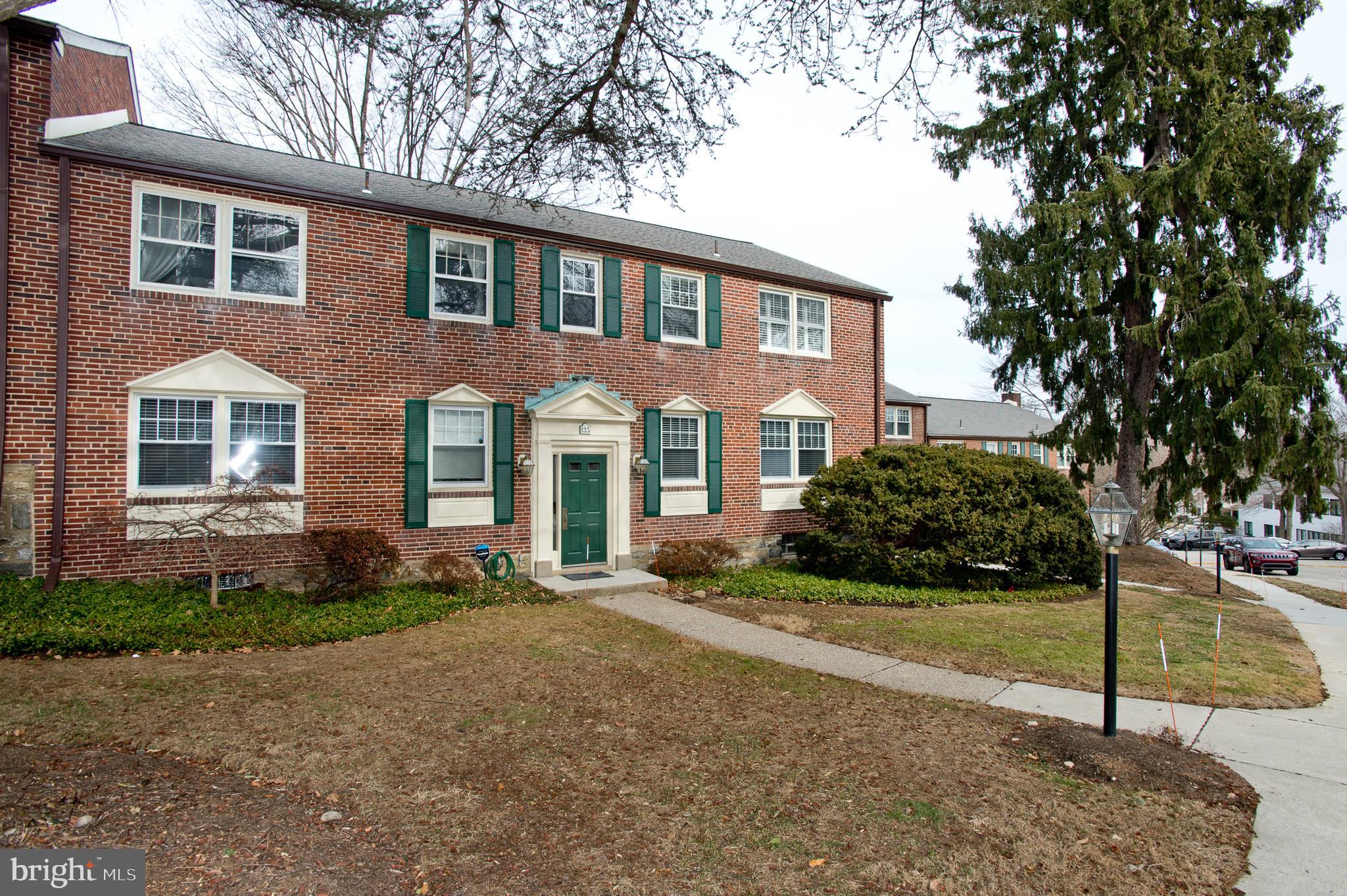 500 East Lancaster Avenue, Unit 135A Wayne, PA 19087 - Photo 24 of 24 a front view of a house with a yard and trees