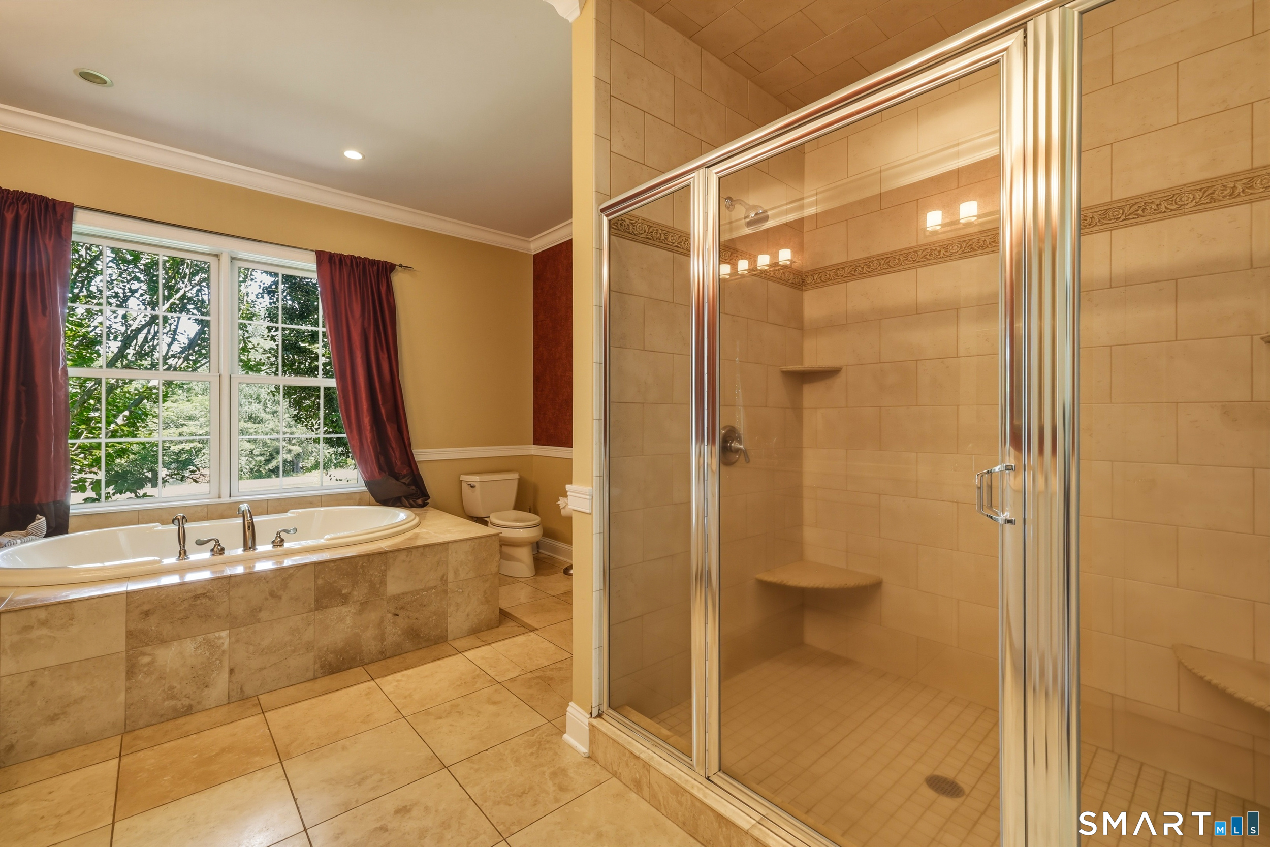 122 Lower Road Guilford, CT 06437 - Photo 17 of 40 Master bath with tile flooring and surround, separate shower and tub.