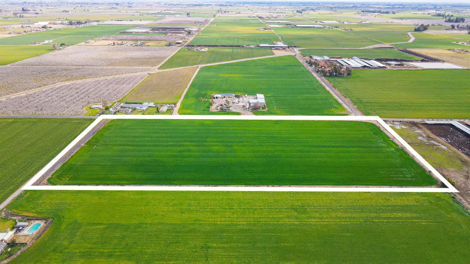 a view of a golf course with a park