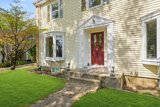 a front view of house with yard