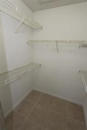a view of a room with racks on the wall