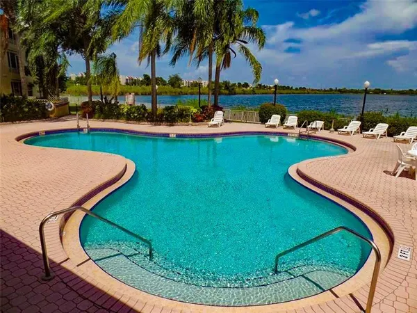 front view of a house with a swimming pool