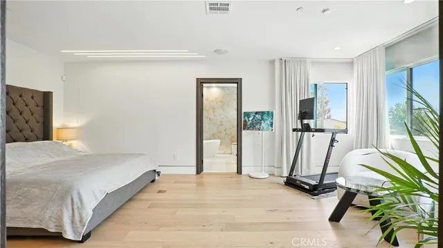 a white bath tub sitting in a bathroom