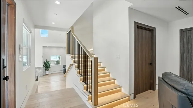 a bedroom with a bed and a desk