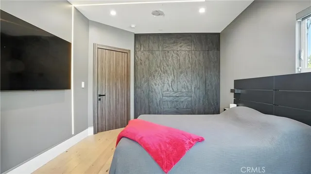 an aerial view of a house with garden space and street view