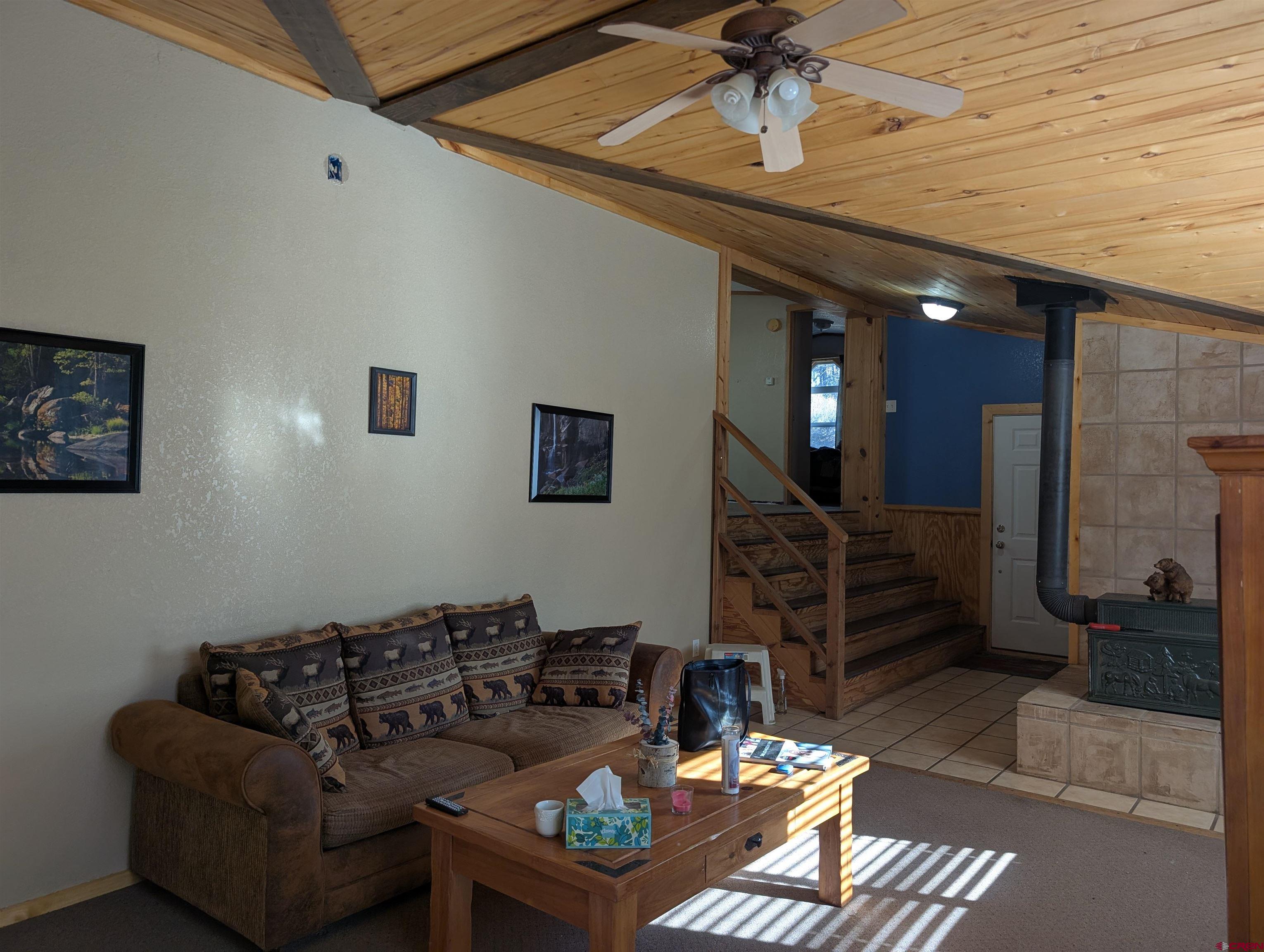 472 Haystack Circle Pagosa Springs, CO 81147 - Photo 11 of 34 a living room with furniture