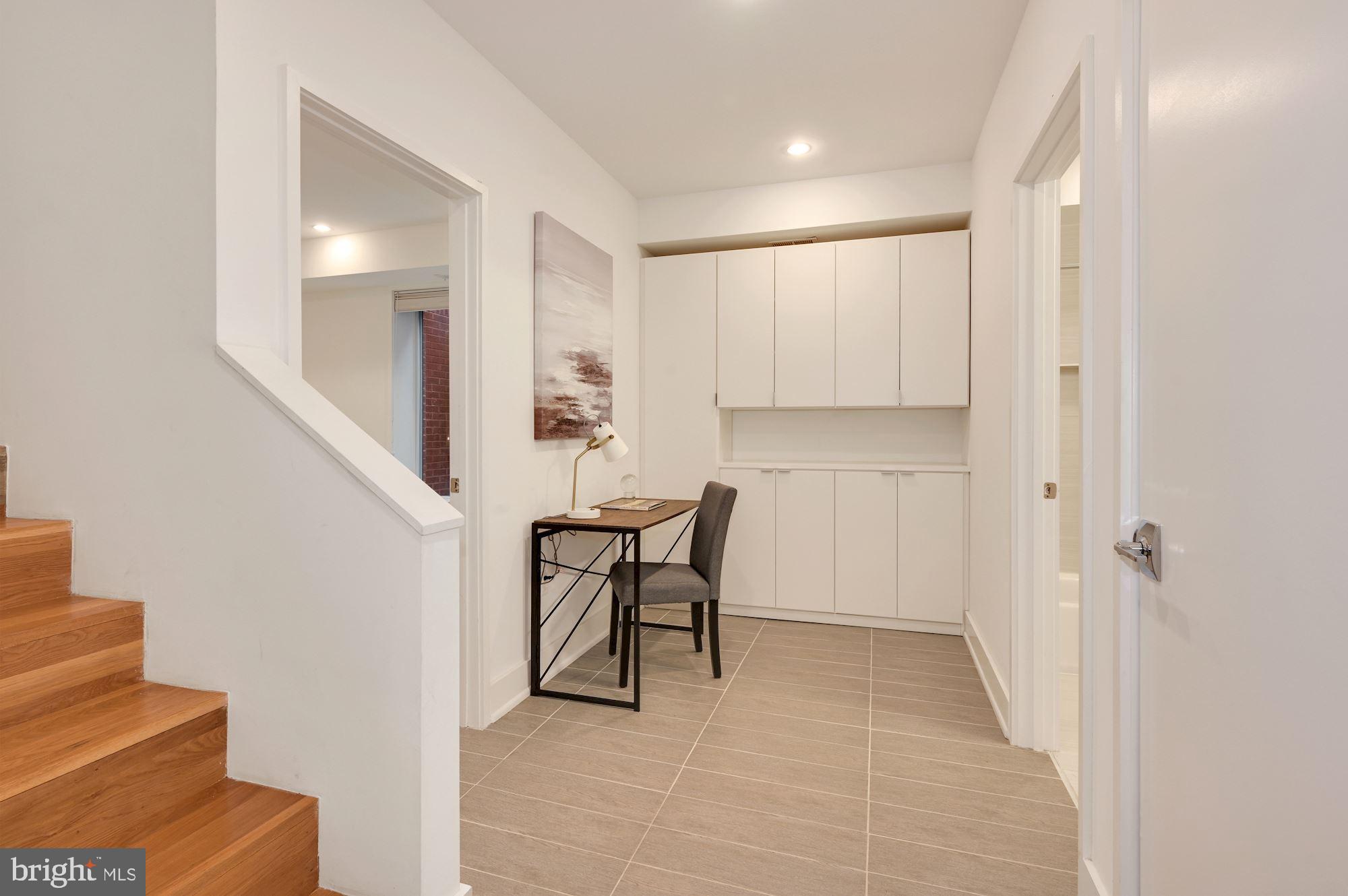 4529 MacArthur Boulevard Northwest, Unit 2 Washington, DC 20007 - Photo 14 of 28 Lower Level with Custom Cabinetry