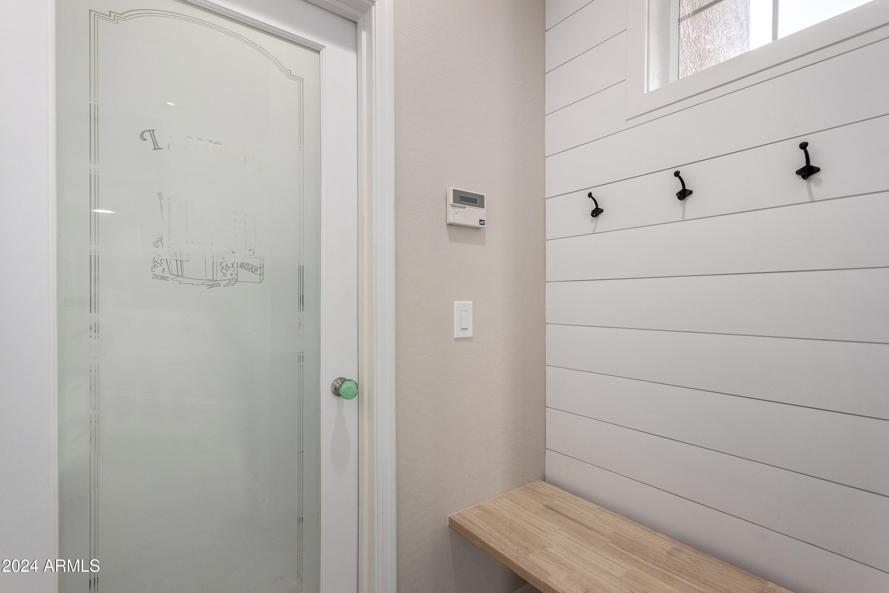 5246 East Estevan Road Phoenix, AZ 85054 - Photo 29 of 40 Laundry room glass door
