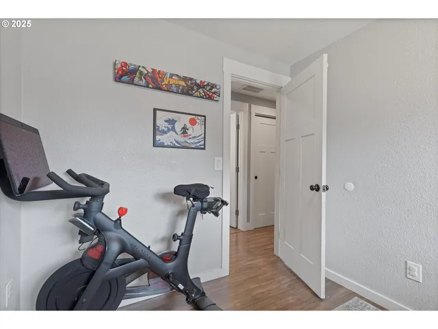 a view of a room with gym equipment