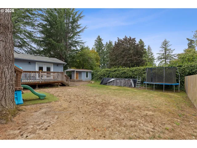a house view with a backyard space