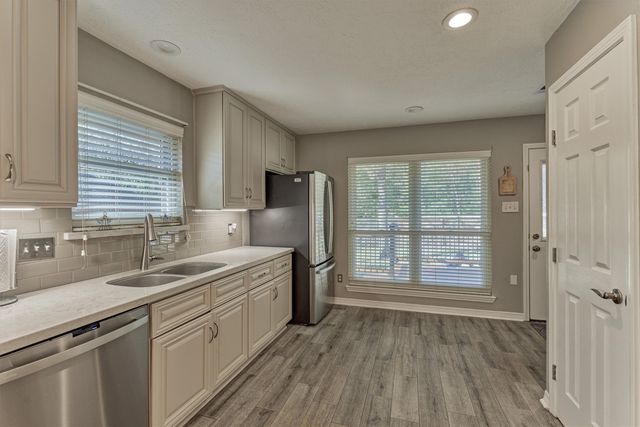 a utility room with washer and dryer