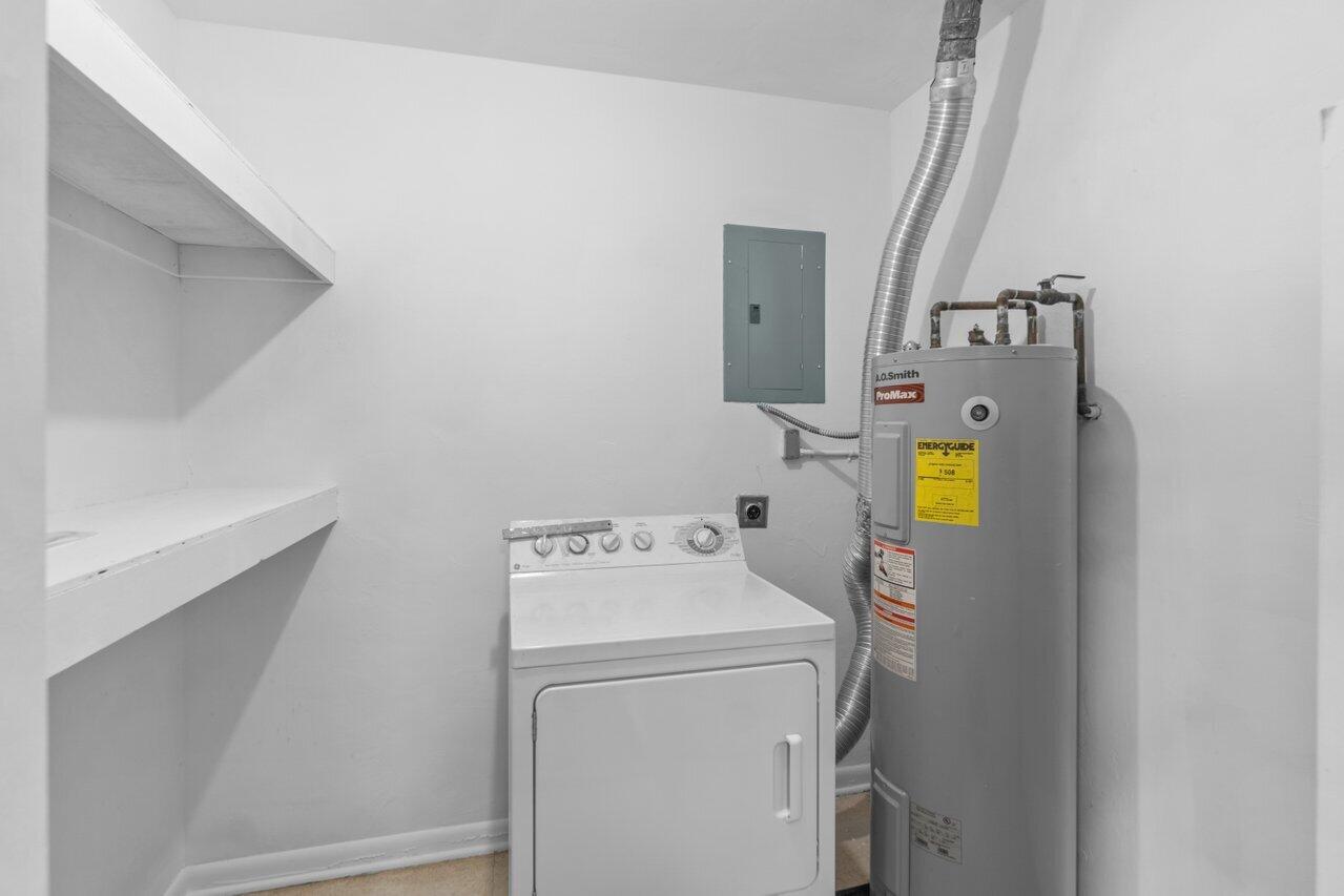 671 West 35th Street Riviera Beach, FL 33404 - Photo 9 of 27 Enclosed Laundry Room