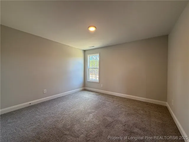 a bathroom with a toilet a sink and bathtub