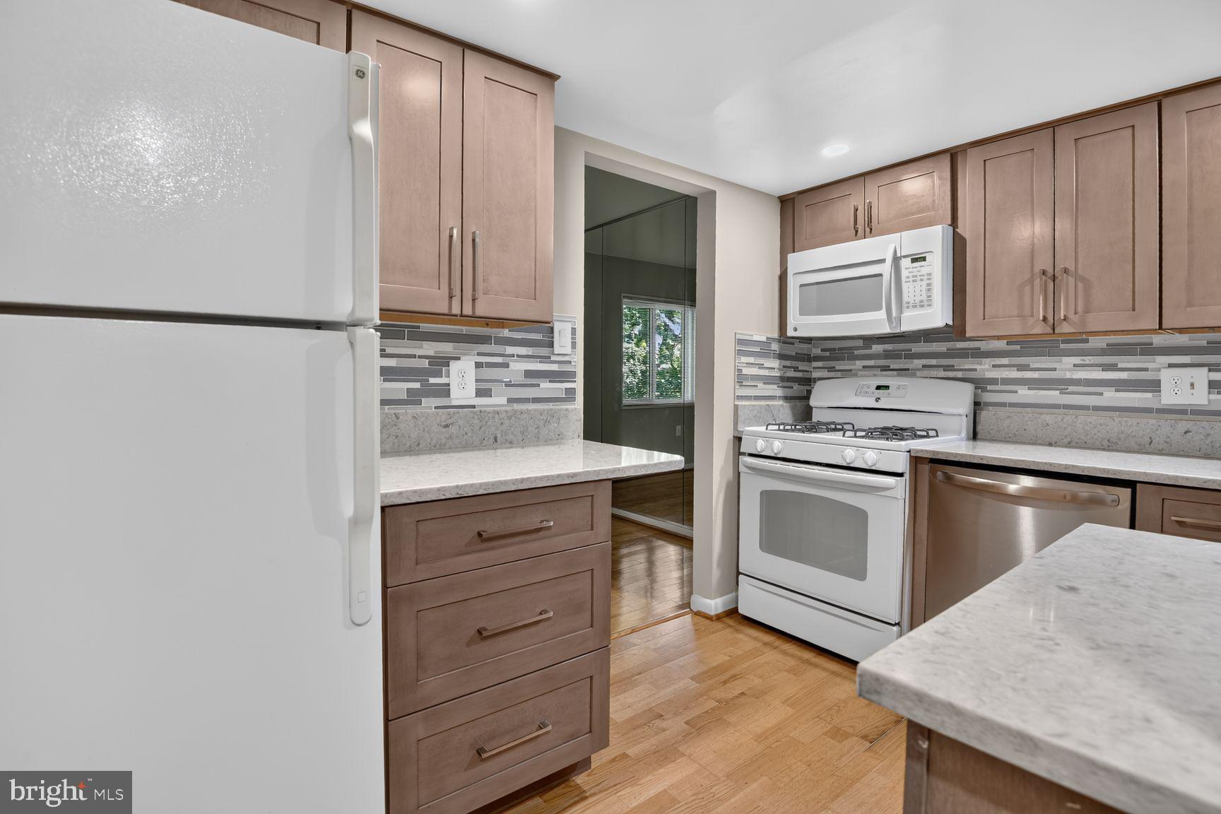 1534 Northgate Square, Unit 11C Reston, VA 20190 - Photo 12 of 37 Modern kitchen with sleek finishes.