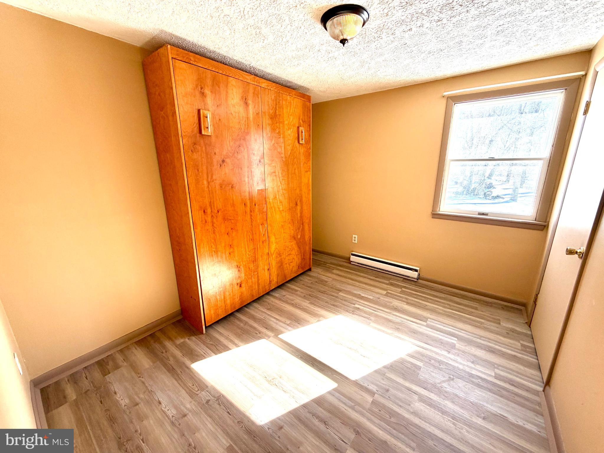 292 West Richardson Road Airville, PA 17302 - Photo 7 of 19 Cozy room with warm wood accents.