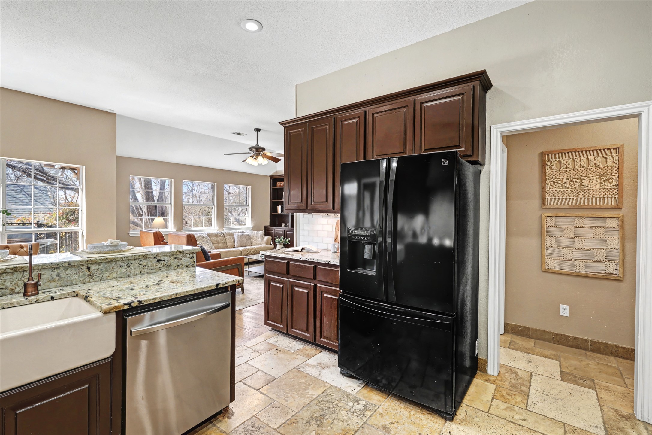 3022 Addie Lane Georgetown, TX 78628 - Photo 19 of 40 a kitchen with stainless steel appliances granite countertop a refrigerator stove and sink