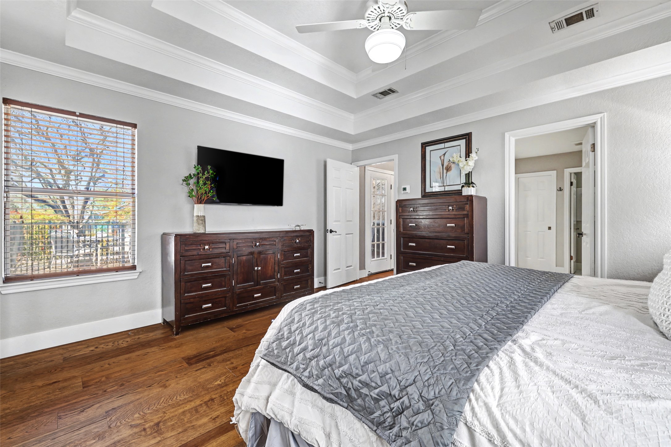 3022 Addie Lane Georgetown, TX 78628 - Photo 22 of 40 a bedroom with a bed and a flat screen tv