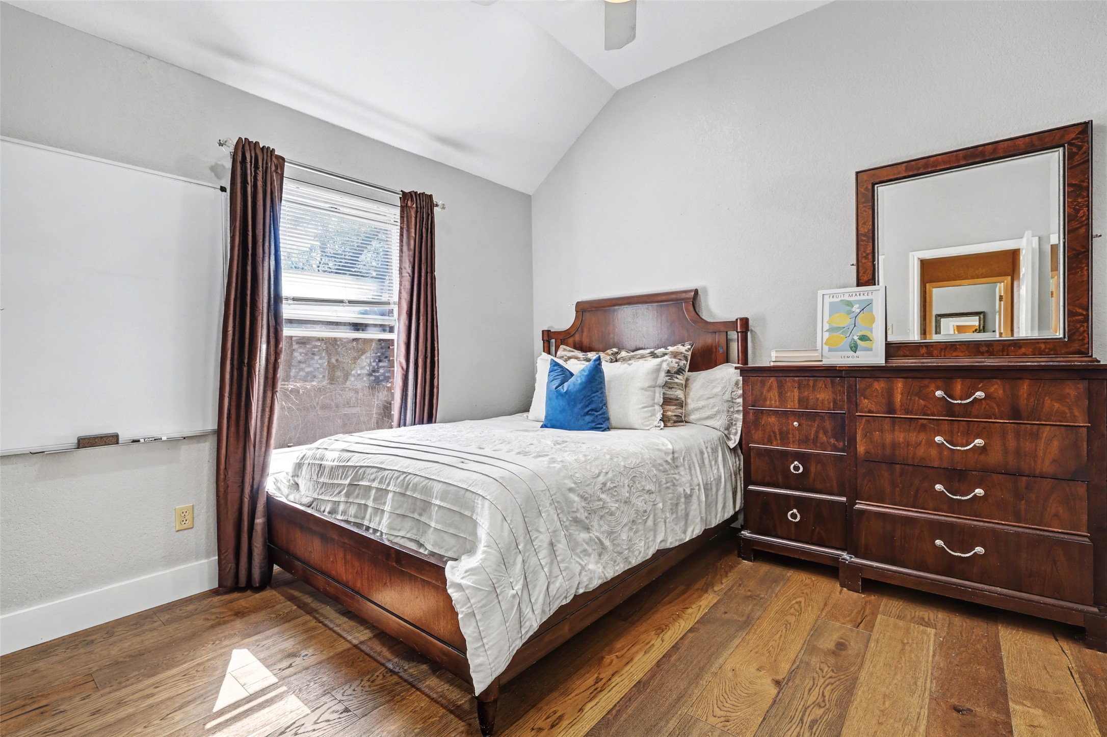 3022 Addie Lane Georgetown, TX 78628 - Photo 28 of 40 a bedroom with a bed and a dresser