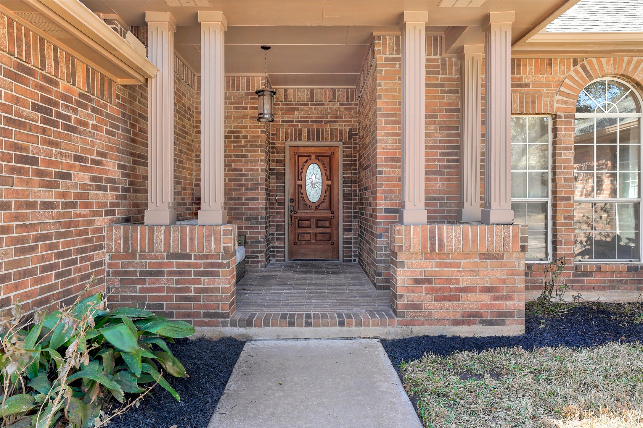 3022 Addie Lane Georgetown, TX 78628 - Photo 3 of 40 a front view of a house with a garden