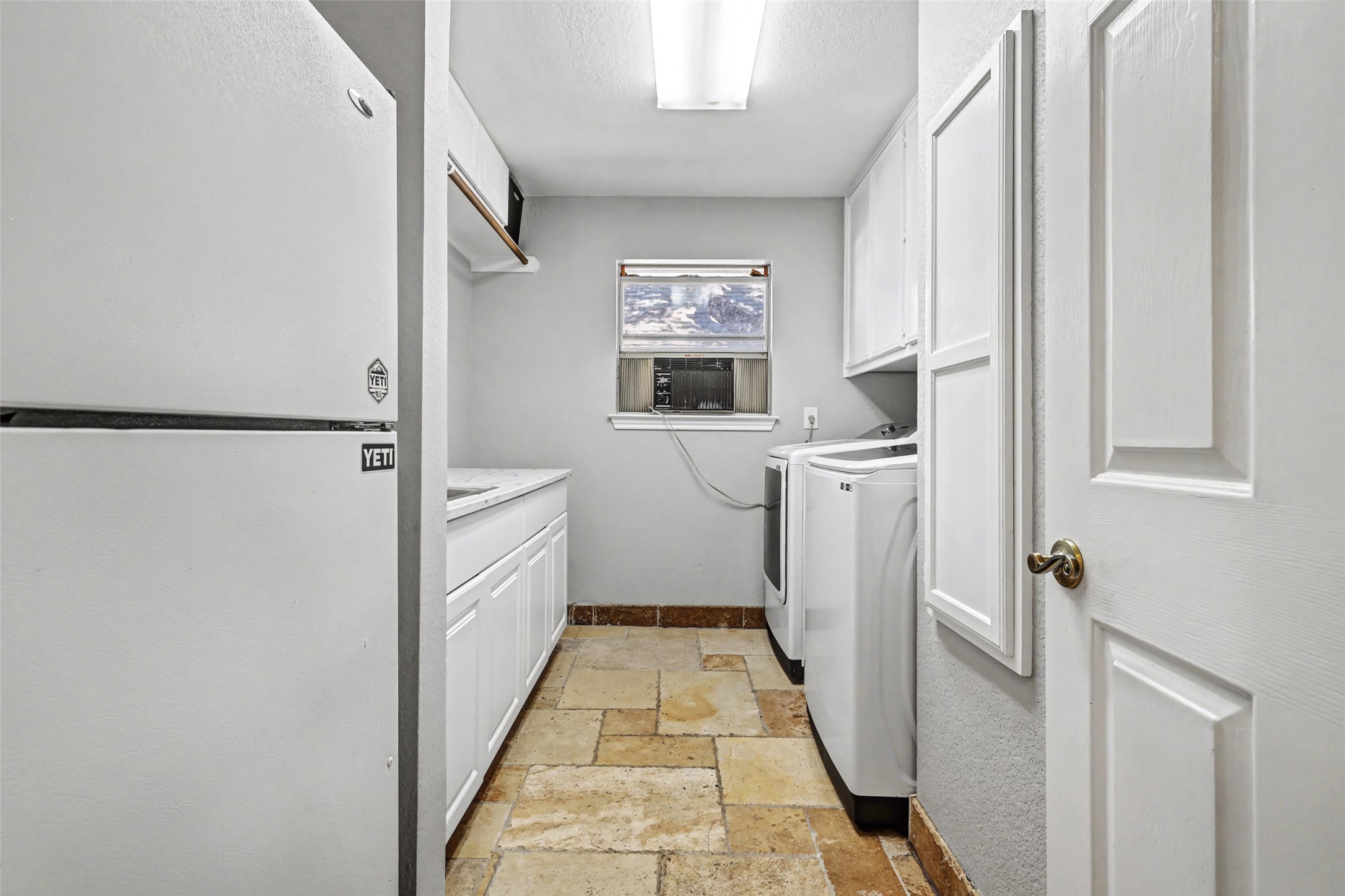 3022 Addie Lane Georgetown, TX 78628 - Photo 32 of 40 a bathroom with a sink a toilet a window and vanity