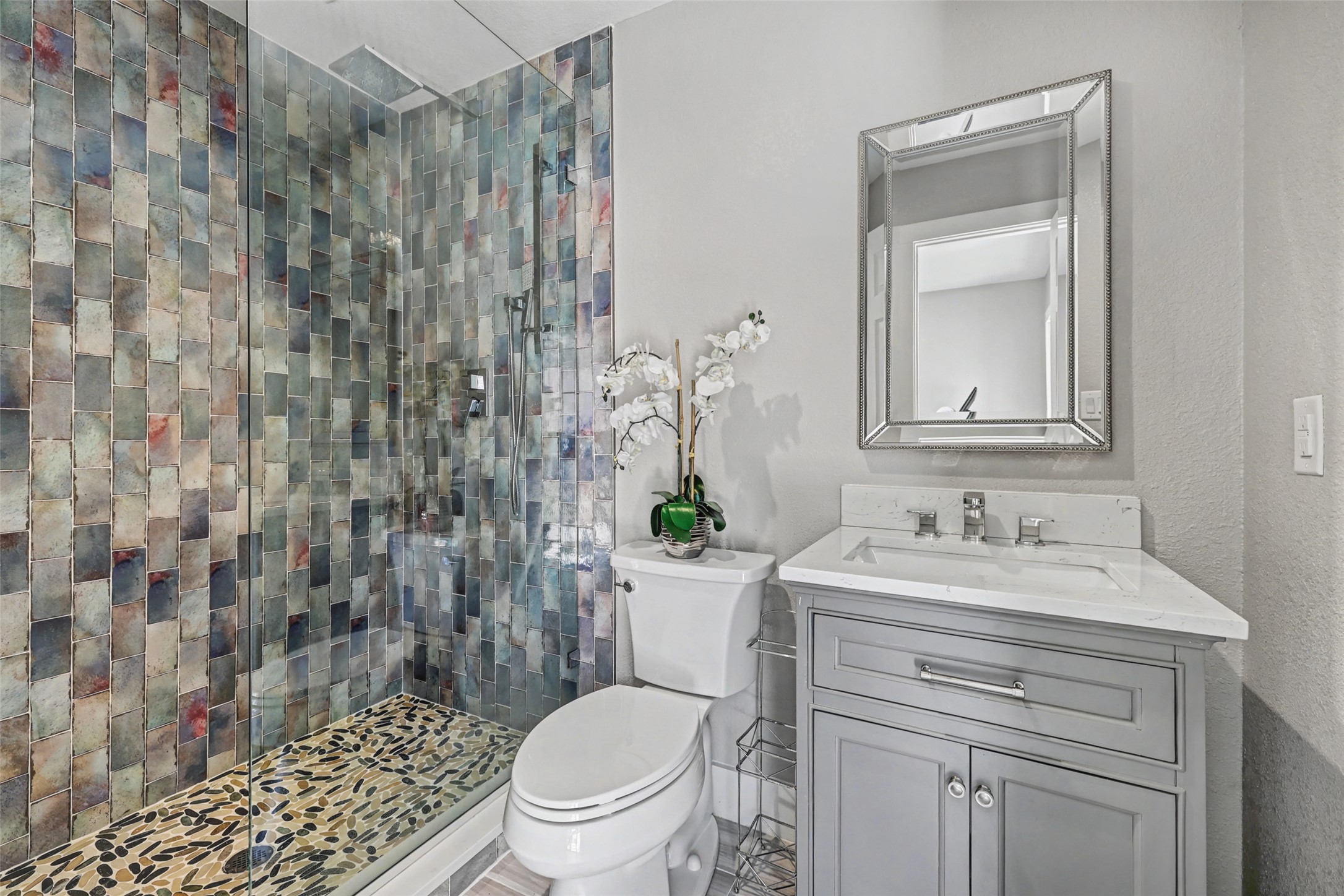 3022 Addie Lane Georgetown, TX 78628 - Photo 39 of 40 a bathroom with a sink toilet and shower