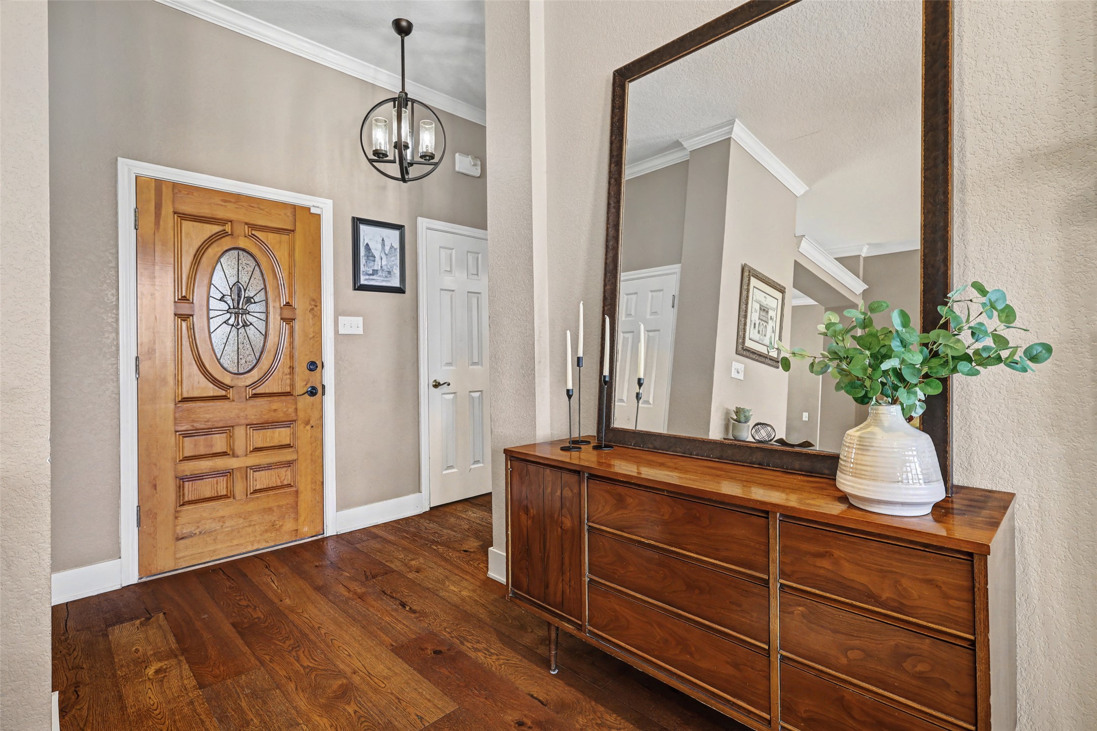 3022 Addie Lane Georgetown, TX 78628 - Photo 5 of 40 a view of a hallway with wooden floor and cabinet