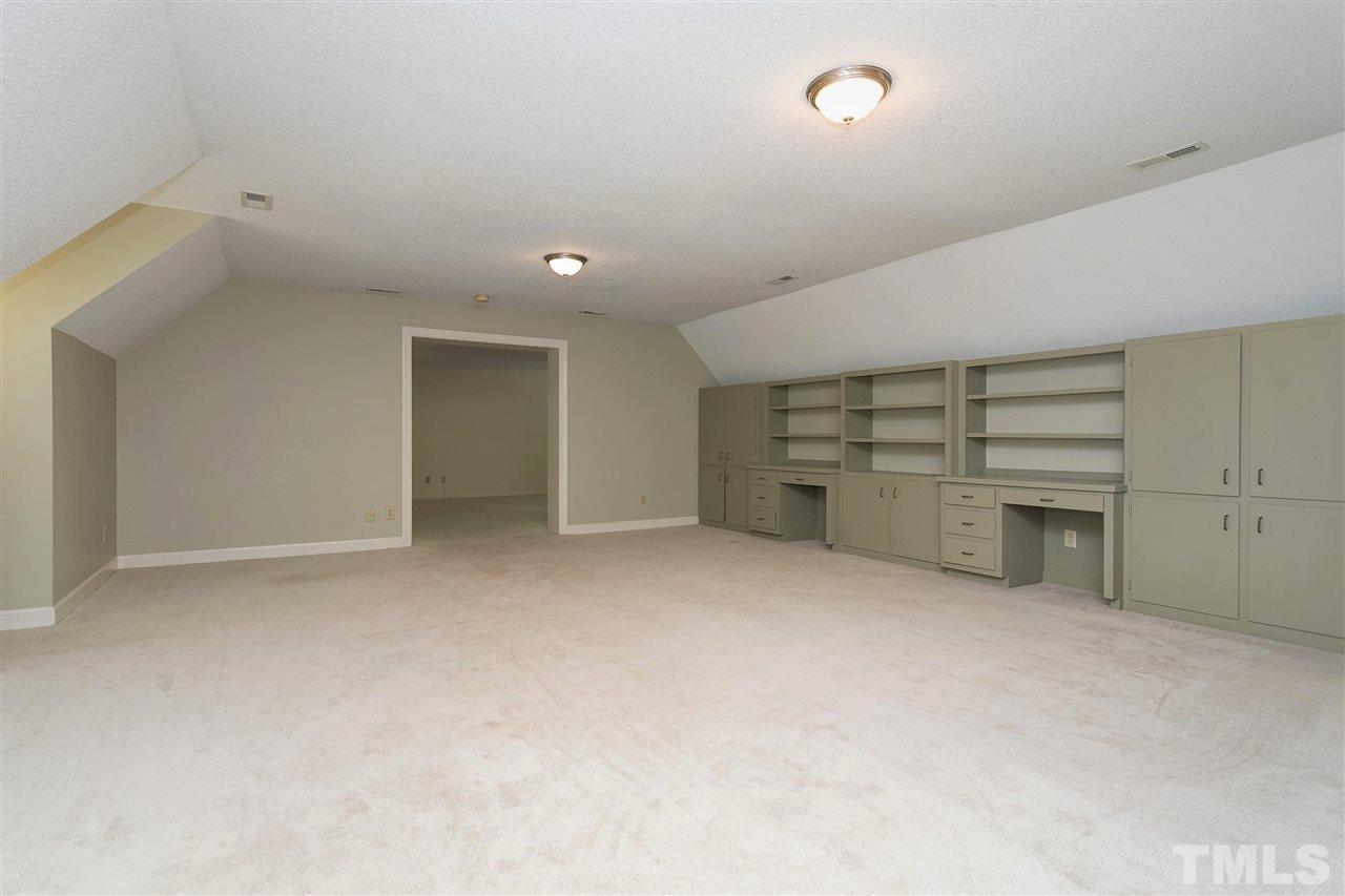 305 Queensferry Road Cary, NC 27511 - Photo 19 of 28 a view of a big room with closet and cabinet