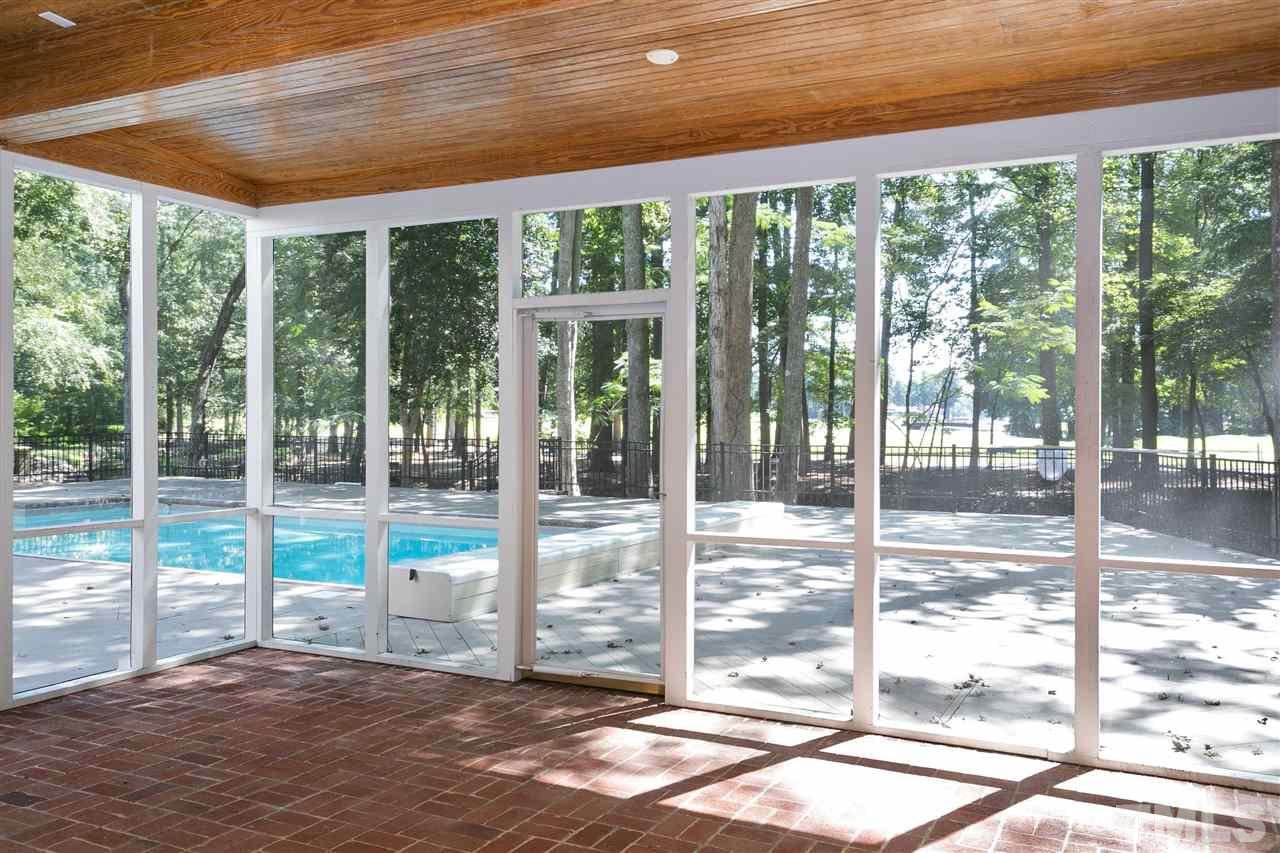 305 Queensferry Road Cary, NC 27511 - Photo 22 of 28 a view of porch with a backyard
