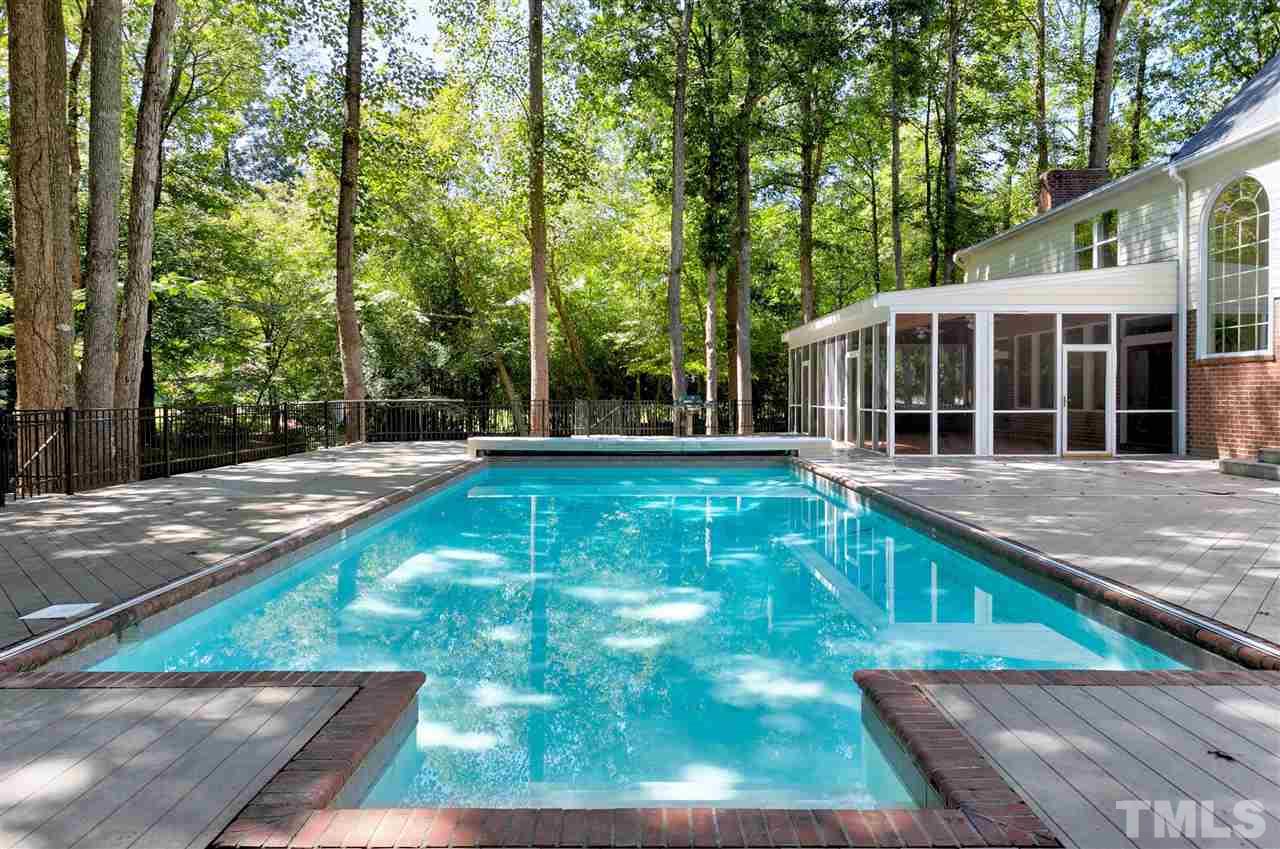 305 Queensferry Road Cary, NC 27511 - Photo 25 of 28 a view of a house with backyard and sitting area