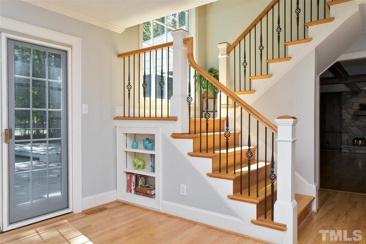 305 Queensferry Road Cary, NC 27511 - Photo 7 of 28 a view of entryway and hall with wooden floor