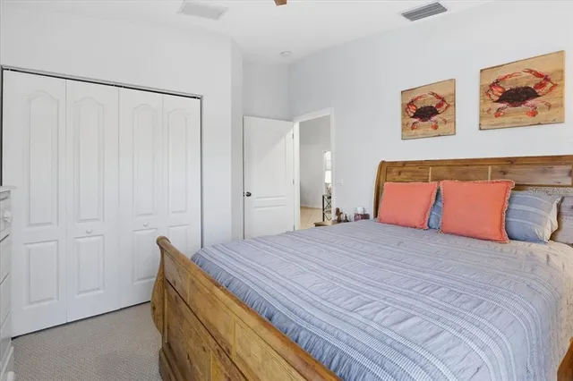 a bedroom with a bed and with furniture